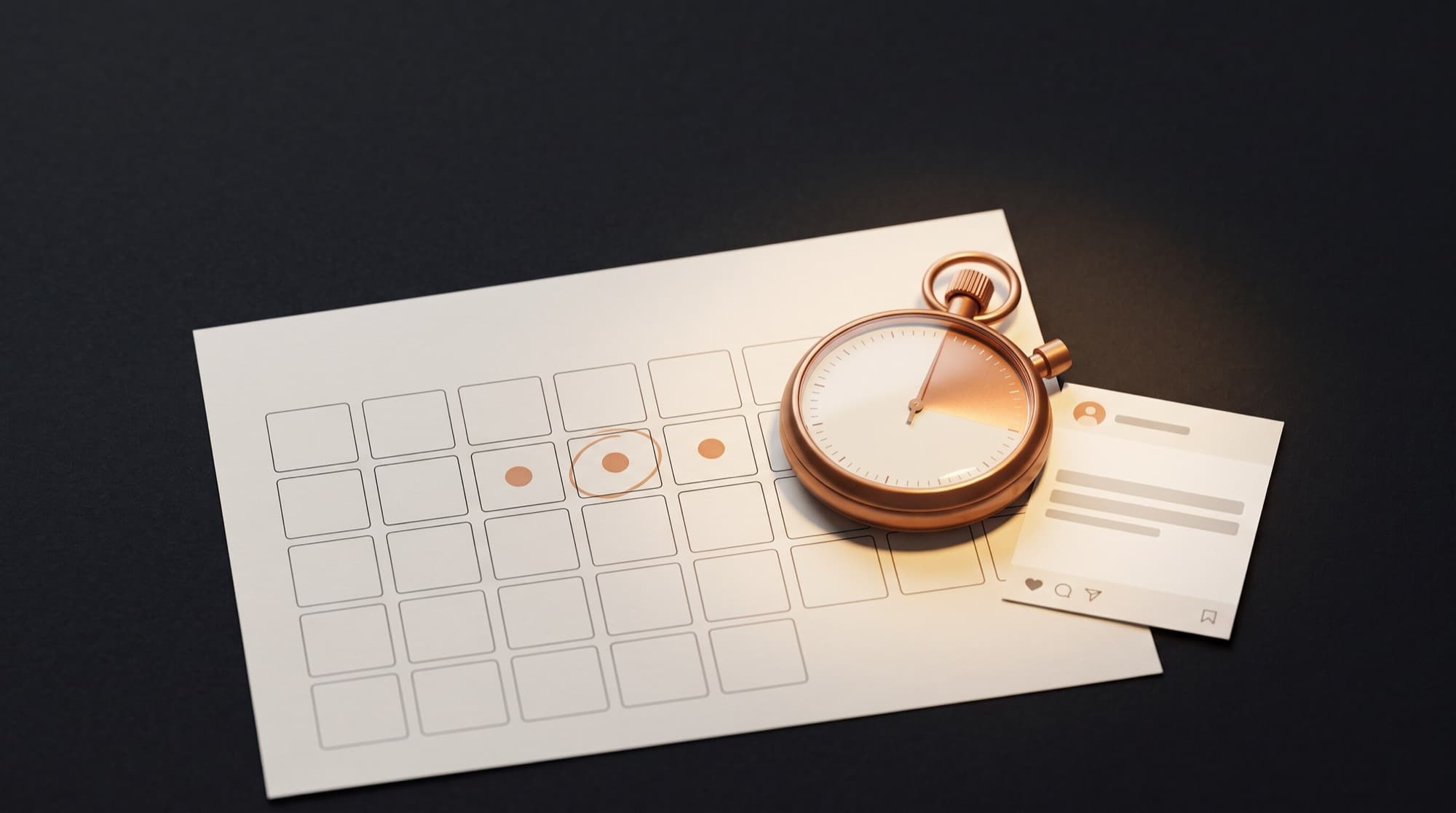 A copper stopwatch with the first arc of its dial marked in copper, resting on a cream paper calendar with a midweek cluster of days circled, beside a small social post card showing like, comment, send, and save icons, on a dark charcoal desk.